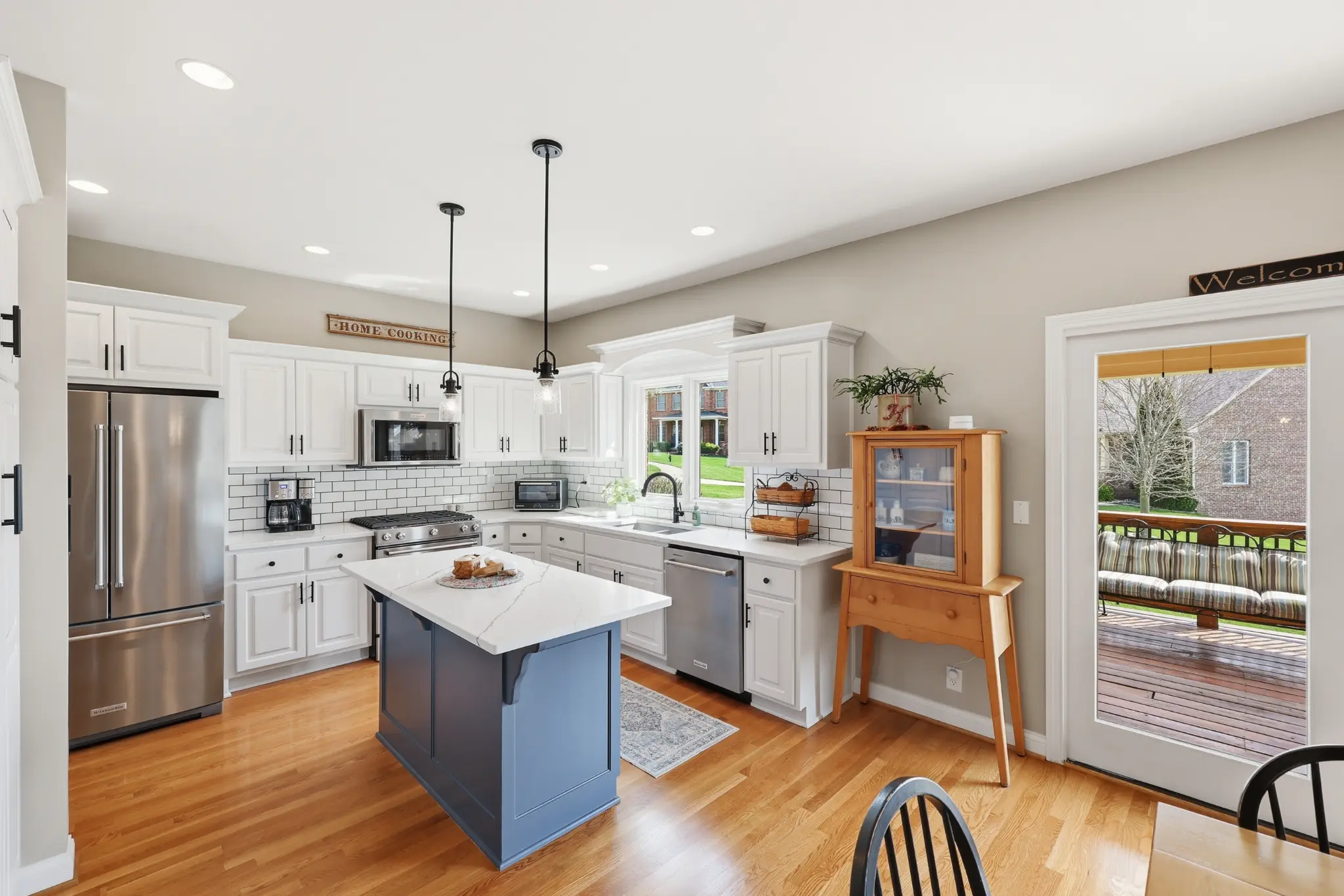 Thumbnail: Kitchen · Quartz counters · Opens to deck